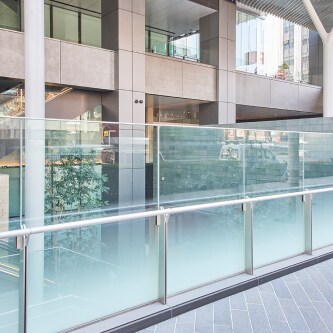 glass railing with decorative glass finish applied
