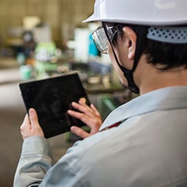 Person using tablet at work location