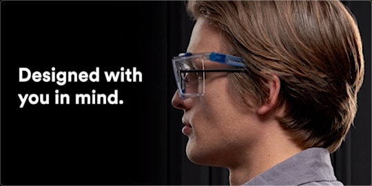 Worker wearing SecureFit 370 OTG Series safety eyewear in blue frame with clear lens
