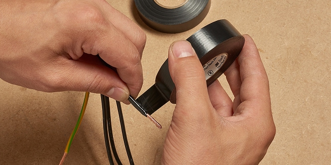 low voltage electrical cable wrapped in general use electrical tape

