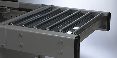 Image of a conveyer belt extension attached to a 3M-Matic™ Case Sealer

