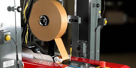 Paper sealing tape in a an automated sealer.
