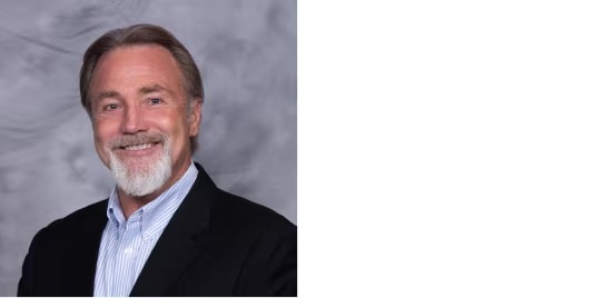 Professional color headshot.
