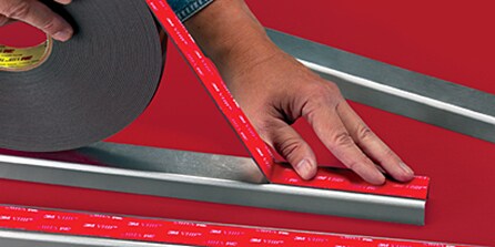 hand applying bonding material
