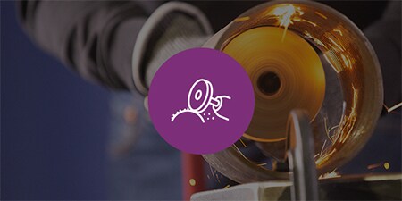 white envelope icon against a semi transparent black background showing hands on a laptop keyboard
