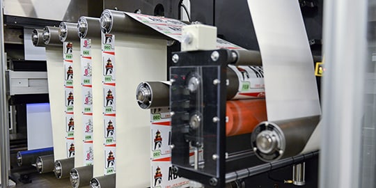 An image of a computer monitor shows the Plate Builder dashboard.
