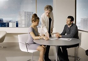 Video shows employees in a comfortable work environment near windows using 3M heat control window films.