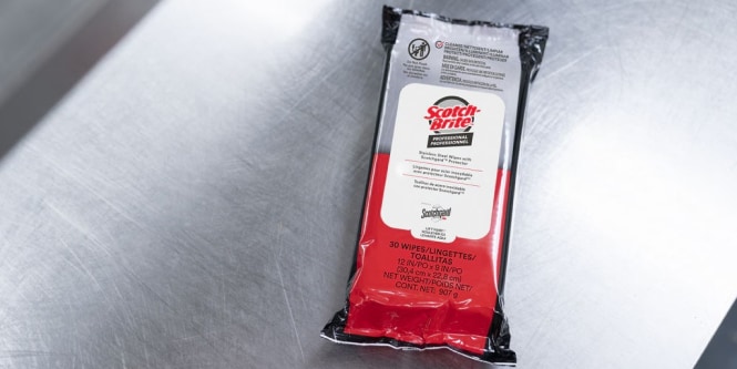 3M stainless steel wipes to clean a commercial kitchen.
