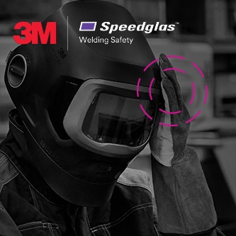 welder wearing 3M speedlgas welding helmet taping head
