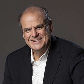 Photograph of Dennis Mick, FAA Designated Engineering Representative (DER).