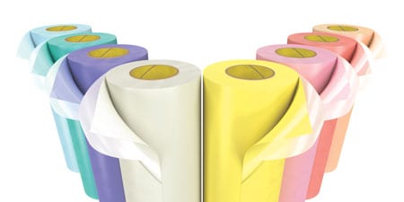 Multi-colored rolls of 3M Cushion-Mount Plus Training Tape arranged in a V-shape against a white background.
