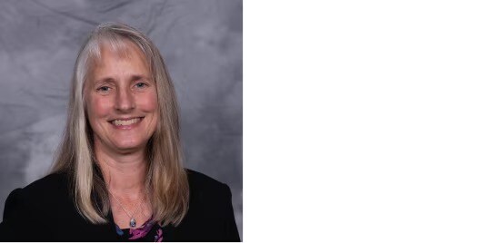 Professional color headshot.
