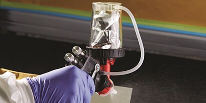 HGP gun applying anti-chip coating to vehicle
