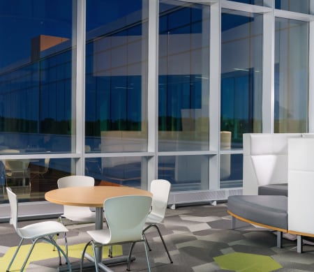 3M™ Sun Control Window Film Night Vision Series applied to large glass windows in an office
