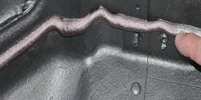 Foam sealant in use on vehicle