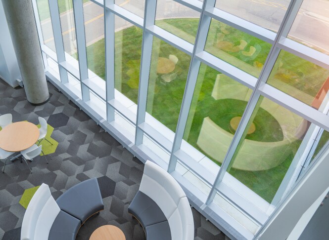 above view of open space with floor to ceiling windows
