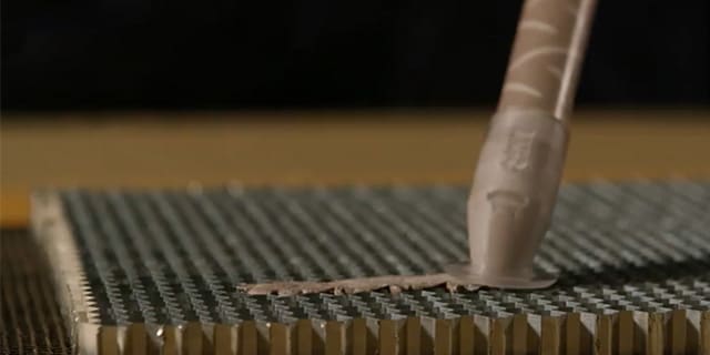 Aerospace adhesives being applied.
