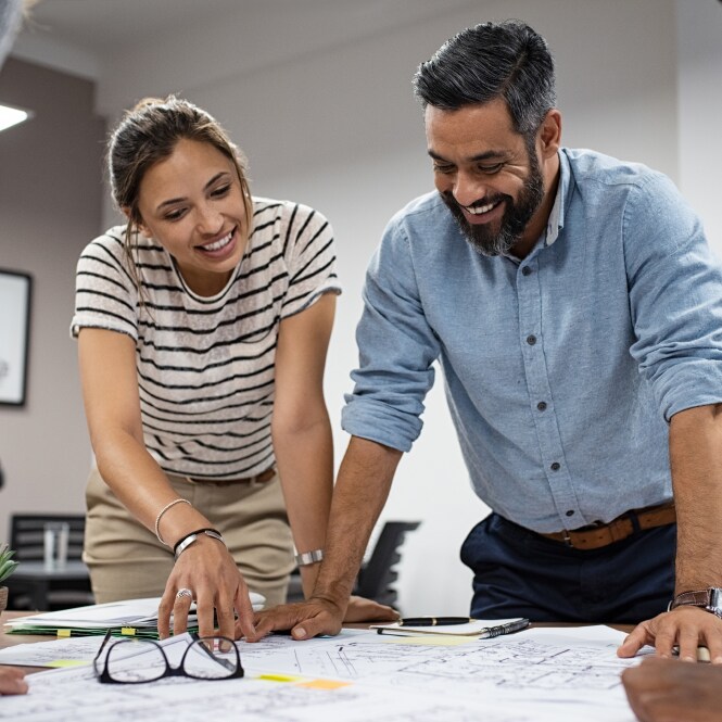 people collaborating at a desk
