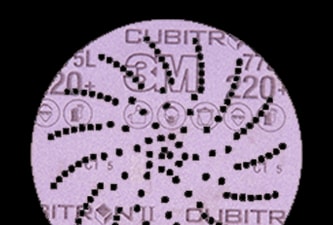 3M Xtract™ Cubitron™ II film disc 775L on black background
