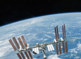Space station orbiting Earth using advanced materials for reliable space systems.