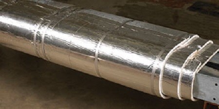 A 3M endothermic mat encloses pipe.

