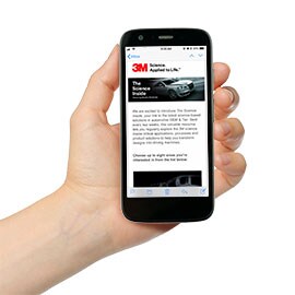 email on phone in hand