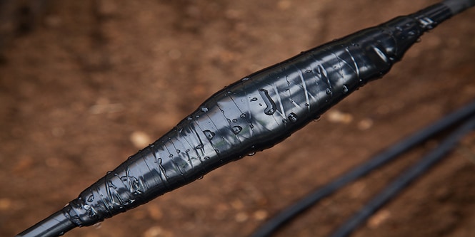 vinyl electrical tape overwrapping electrical splice
