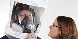 person completing a respirator fit test
