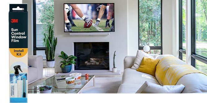3M™ Sun Control Window Film Install Kit next to an image of a modern living room with a tv on the wall.
