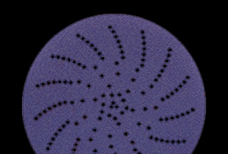 3M Xtract™ Cubitron­™ II cloth disc 900DZ on black background
