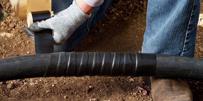 electrical cable on ground wrapped in 3M Tape 2234
