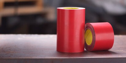 Red 3M™ Fire and Water Barrier Tape in two different sizes.
