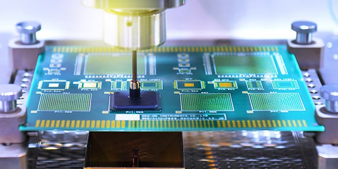 Robotic machine assembling components on a green PCB next to text reading “Simplify industrial PCB design and assembly.

