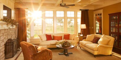 A living room with window films.
