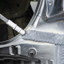 3M OEM Match Seam Sealer being applied to vehicle panel