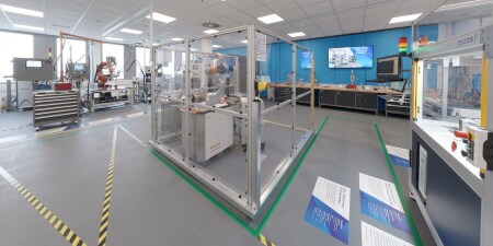 Image of the room including several machines at the Neuss Bonding Process Center
