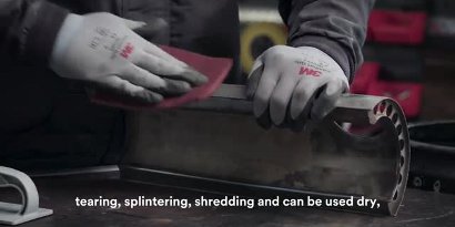 image of screenshot from video showing a person inspecting a part
