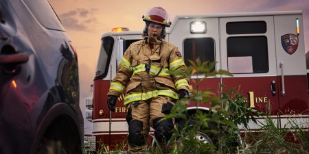 Firefighter in vehicle extrication operation using a 3M PELTOR ComTac VI NIB Headset
