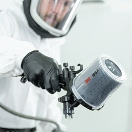 paint technician paint spraying using 3M Performance Spray Gun 2