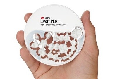 Lava Plus Hand Holding Milled Lava Plus Puck