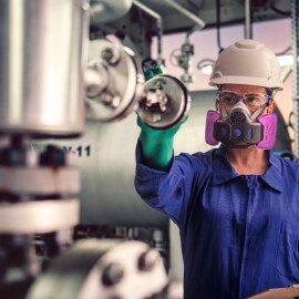 Worker using ppe in a chemical plan