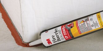 3M Fire Barrier Sealant CP 25WB+ applied to a corner joint for fire protection.
