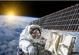 Astronaut working in orbit with solar panels, representing 3M materials science for space exploration.