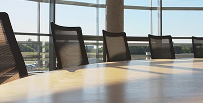 Sunlight streams through a boardroom window with 3M™ Window Films covering, leaving no worry of hot or cold spots.
