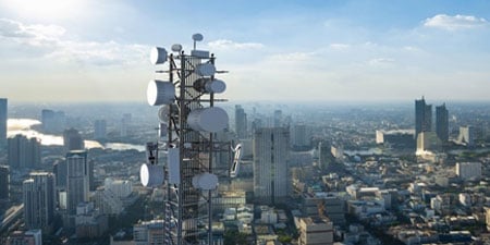 Photo of a skyline with 5G network infrastructure.