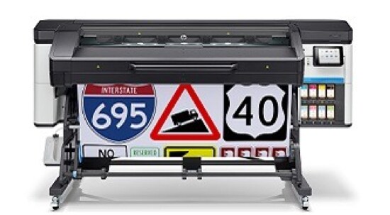 A large, HP Latex 700 digital sign printer, printing  street signs.