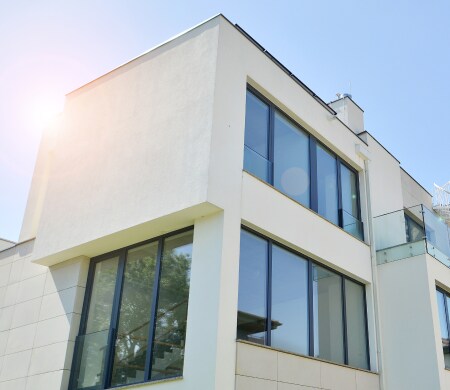 Modern home with window film supporting energy savings.
