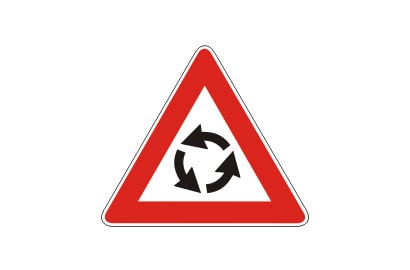 Roundabout warning sign, red outline with white middle and black arrows