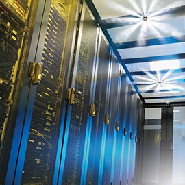 Data center with fire protection fluid spraying from nozzles on ceiling